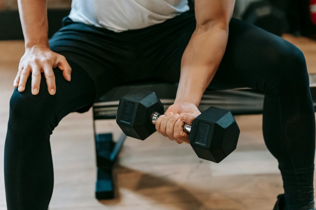 Man carrying dumbell